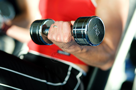 训练手重运动重量闲暇运动员身体锻炼成人红色肌肉图片