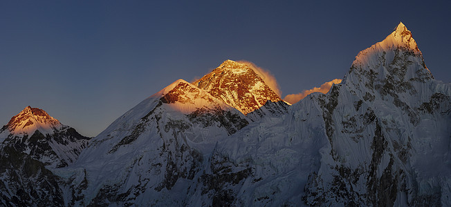 日落或日出时珠峰和努斯首脑会议天空公吨风景远足地区旅游旅行公园国家顶峰图片