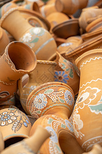 有样式和装饰品的传统乌克兰瓦器厨具乡村陶器水壶职业销售市场盘子陶瓷文化图片