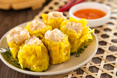 Siu Mai  中国竹轮蒸汽猪尾箱的中国蒸猪排小吃点心食物碎麦猪肉饺子盘子水饺午餐美食图片