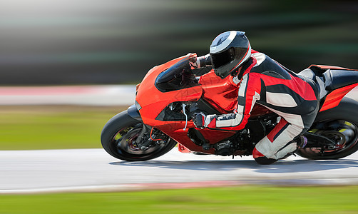 摩托车倾斜到赛道的快角车轮赛车发动机赛车手运输速度大奖赛引擎运动锦标赛图片