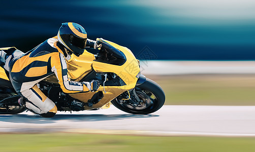 摩托车倾斜到赛道的快角自行车公路发动机角落运输速度赛车冠军转弯大奖赛图片