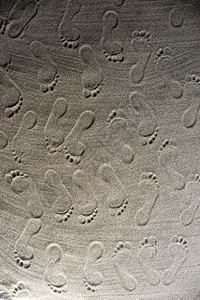 圣地的脚印打印假期海滩背景图片