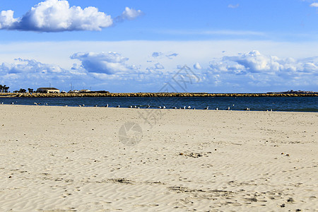 早上在西班牙南部圣波拉的海滩上公园阳光地平线海景全景太阳晴天假期季节旅行图片