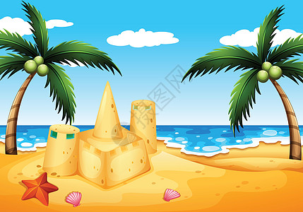 有椰子树和沙堡的海滩图片
