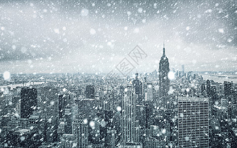纽约冬季的冬天暴风雪市中心街道雪花城市房子季节建筑中心建筑物图片