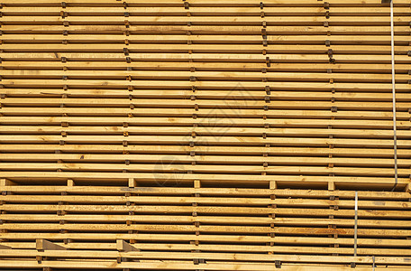 在锯木厂存放成堆的木板 木板堆放在木工车间 木材的锯切干燥和销售 用于家具生产 建筑的松木 木材业铺板加工森林库存出口硬木材料木图片