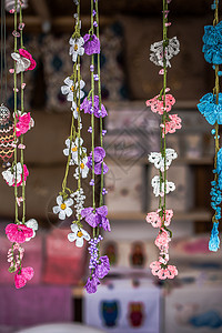 五颜六色的刺绣花作为背景纺织品装饰品缝纫绳索手工织物火鸡刺绣工艺装饰背景图片