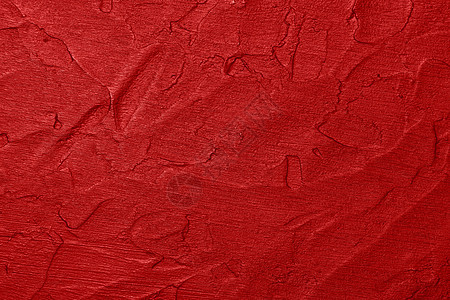 红色凹凸不平的垃圾表面抽象背景背景图片