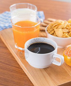 餐桌早餐套餐桌子玻璃饼干食物水果果汁咖啡橙子饮食奶昔图片