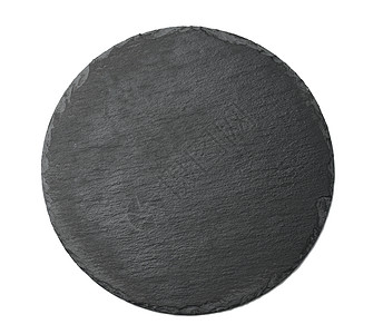 用于在白背景上孤立的盘子服务的空黑圆石墨面板石板岩石材料花岗岩食物厨房黑色矿物圆形木板图片