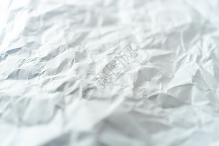 白色皱纸纹理的顶部视图折叠墙纸材料边缘卡片剪贴簿羊皮纸水平折痕手稿图片
