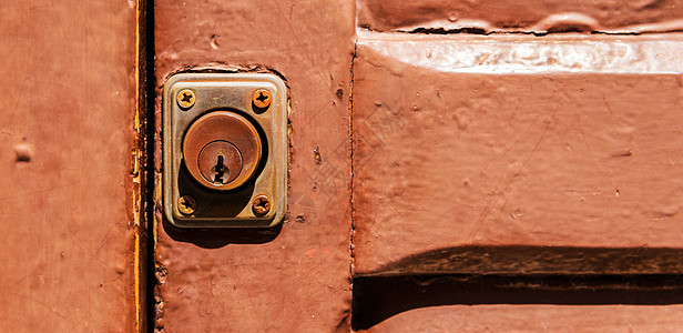 特写旧锁 门锁上有有趣的纹理入口隐私警卫钥匙安全出口腐蚀金属房子古董背景图片