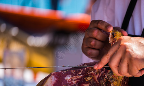 传统西班牙火腿市场主食食物厨师屠夫文化美食刀具猪肉小吃图片