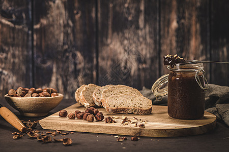 维嘉巧克力扩散蜂蜜榛子可可黄油木头坚果甜点杏仁桌子饮食图片