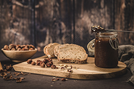 维嘉巧克力扩散奶油木头异国勺子黄油早餐桌子杏仁蜂蜜巧克力图片