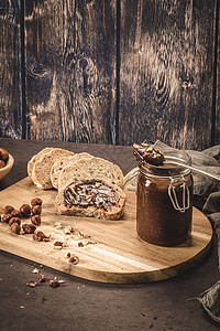 维嘉巧克力扩散面包坚果桌子奶油异国蜂蜜木头勺子可可甜点图片