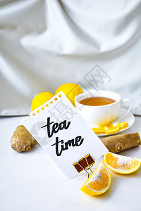 TEA时间写在纸上 作为普通冷冻治疗产品之一     柠檬 姜汁 甘菊茶温度疾病流感杯子水果康复维生素治愈香料药品图片