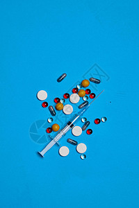 药罐维生素胶囊医学蓝色背景制药医疗红色化学品处方治疗药店药物药品抗生素图片