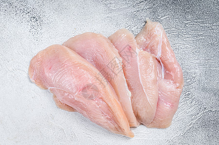 Raw 切片鸡肉排 白色背景 顶级风景家禽黑色饮食香料烹饪食物营养美食屠夫草本植物图片