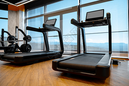 现代体育馆专业跑步机演播室拍摄肌肉中心身体体育锻炼训练工作室跑步力量地面运动背景