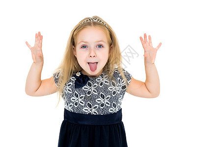 小姑娘用舌头说话 孤立于白人背景情感鬼脸女性幸福孩子展示喜悦婴儿快乐童年图片