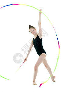 女体操运动员用磁带练习孩子童年锻炼女性舞蹈家微笑身体杂技工作室演员图片