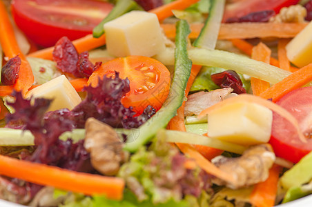 新鲜多彩健康沙拉蔬菜饮食黄瓜核桃盘子维生素食物胡椒美食青菜图片