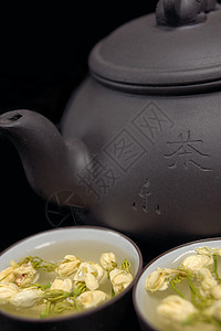 中国茉菊茶壶和杯子茉莉输液花瓣植物茉莉花叶子草本植物图片