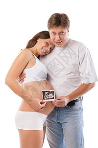 孕妇和丈夫持有超音速超声波女士婴儿子宫父亲胚胎幸福家庭产妇父母孩子图片