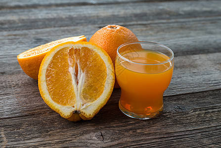 杯子上加橙汁食物液体水果素食主义者营养反射果汁器皿饮料玻璃图片