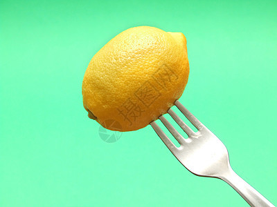 叉口新鲜柠檬饮食水果热带小吃美食食物甜点植物健康营养图片