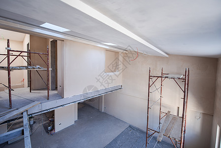 建筑工地内有脚手架工作框架工具装修水泥建筑学地面公寓金属材料背景图片