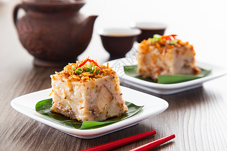 蒸汽 Yam Cake 与底深冻干燥的土豆美食烹饪小吃美味食品点心辣椒早餐立方体淀粉图片