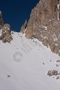 前往雪中滑雪轨道冒险雪崩蓝色国家活动高山粉末旅游假期登山图片