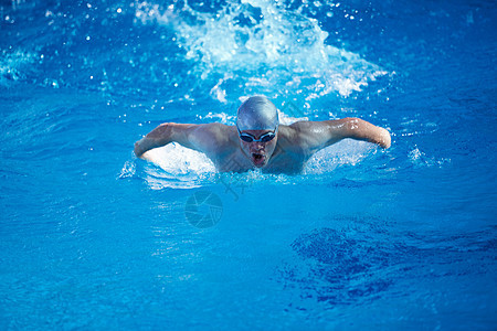 室内游泳便便池上游泳池排水锻炼竞赛水池中风成人蓝色行动活力车道帽子图片