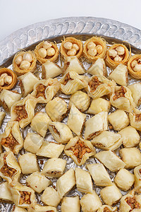 塔基什肉饼甜点食物核桃文化糕点糖浆异国坚果面包蜂蜜蜜饼图片