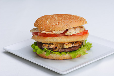 汉堡包芝士牛肉面包饮食美食小吃沙拉洋葱包子午餐图片