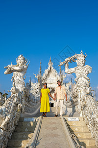 清莱泰国 whithe 寺庙清莱在日落期间 又名白寺 在泰国清莱 全景白色寺庙 Thaialnd宗教反射蓝色文化旅行装饰品教会旅图片