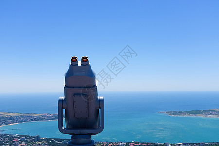 建筑物顶部的望远镜城市吸引力双目经营外表蓝色地标镜片游客全景图片
