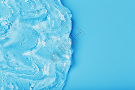 海浪中蓝色背景的抗菌凝胶奶油保健皮肤蜗牛洗发水血清唾液剂量胶原肥皂图片