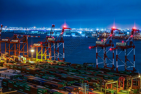 东京Odaiba集装箱码头夜视图组合器夜景烟囱重机船运起重机制造业建筑学建筑运输图片