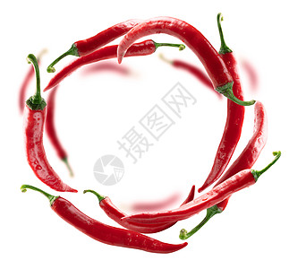 红色热辣椒在白色背景上漂浮辣椒航班悬浮圆圈食物烹饪飞行燃烧厨房戒指图片