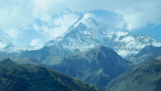 格鲁吉亚Kazbek山和镇远足顶峰地区太阳旅游地标日落天空旅行全景图片