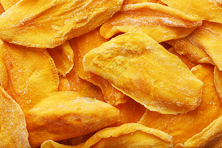 甜意干芒果片 作为全屏背景的近身小吃团体食物橙子脱水市场蔬菜热带纹理营养背景图片