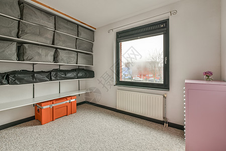 一个明亮舒适的更衣室内阁奢华风格地毯家具敷料盒子加热器衣柜房子图片