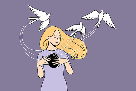 年轻妇女将鸟儿从胸腔中解放出来图片