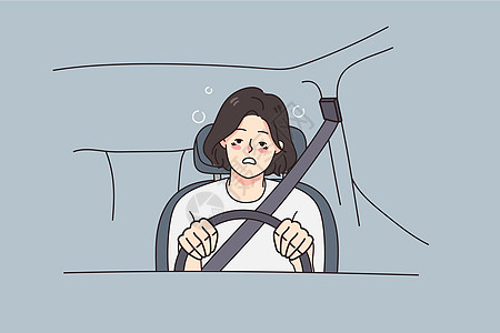疲惫的女人驾驶车时感觉不舒服高清图片