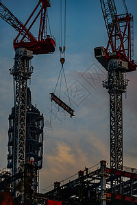 摩天大楼建筑场地工作天空头盔业务建筑群街景建造业城市发展重机机器图片