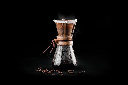 Chemex 咖啡机是一款手动倾倒式玻璃咖啡机 Chemex 是一种冲泡咖啡的设备 冲煮咖啡咖啡师航空调酒师餐厅厨房杯子黑色酿造图片